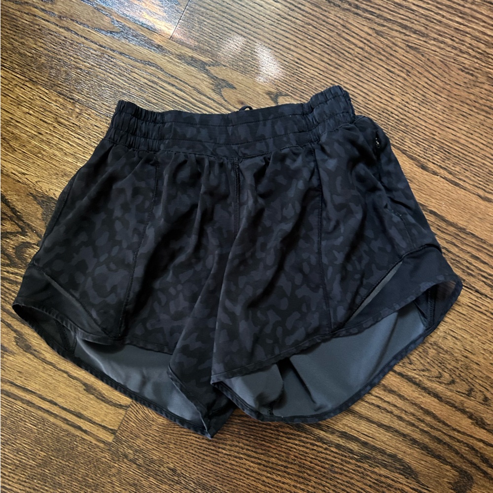 Gently used Lululemon Hotty Hot Black print shorts size 4 Tall Shorts